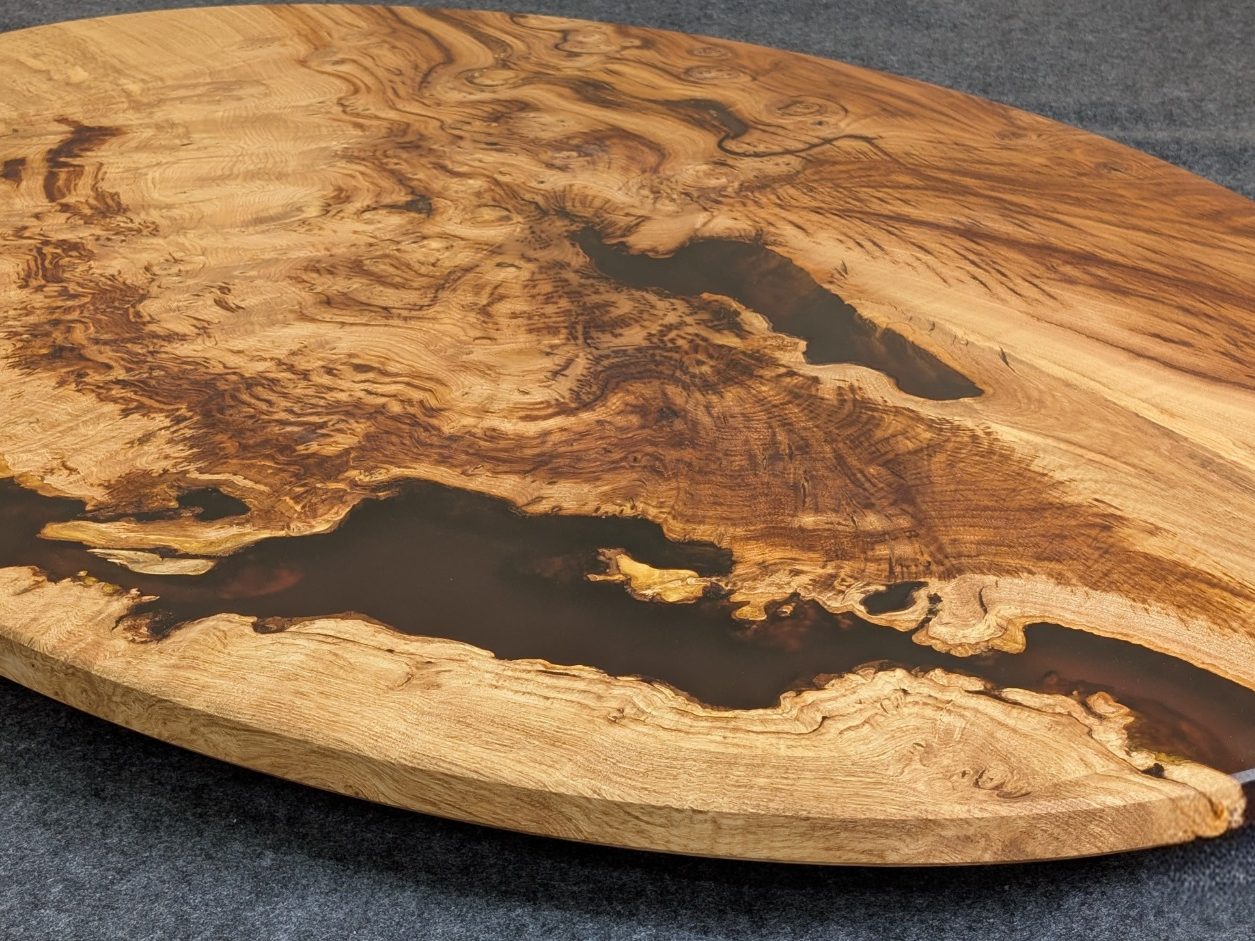Confluence - Chestnut and resin coffee table Chestnut and resin coffee table hand made in Northern Ireland