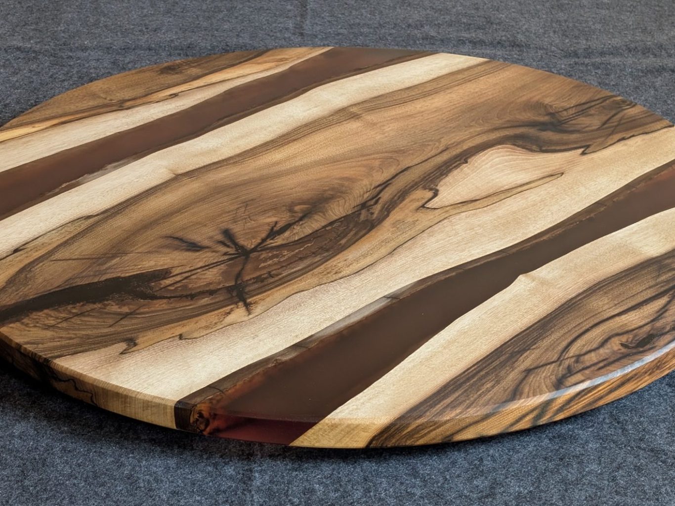 Shadow - Walnut and resin round coffee table Walnut and resin round coffee table hand made in Northern Ireland